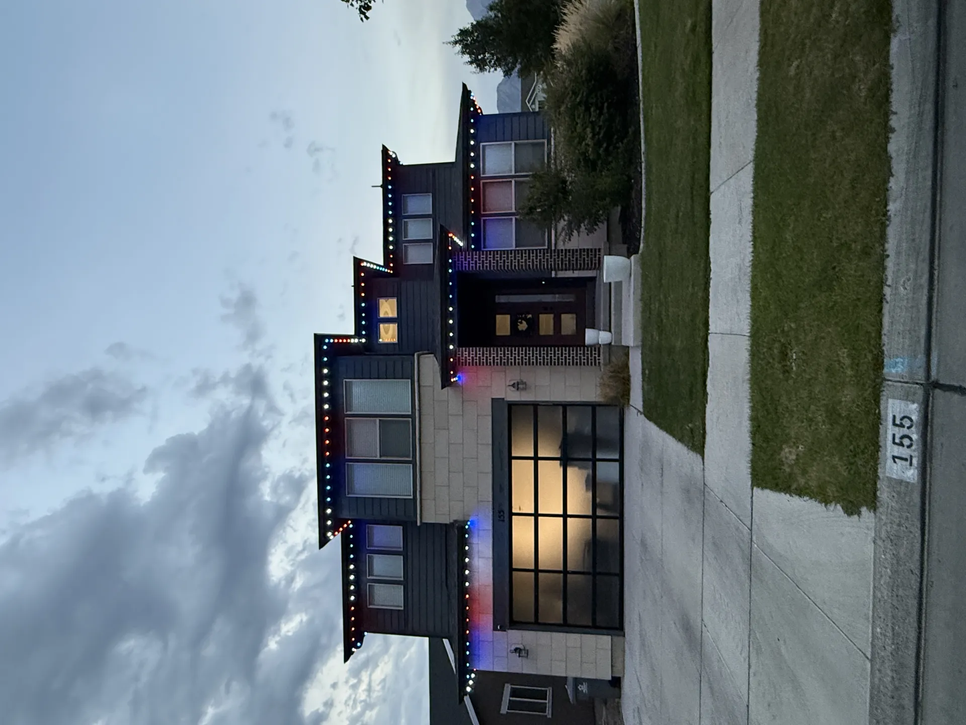 Utah home with permanent landscape and driveway lighting