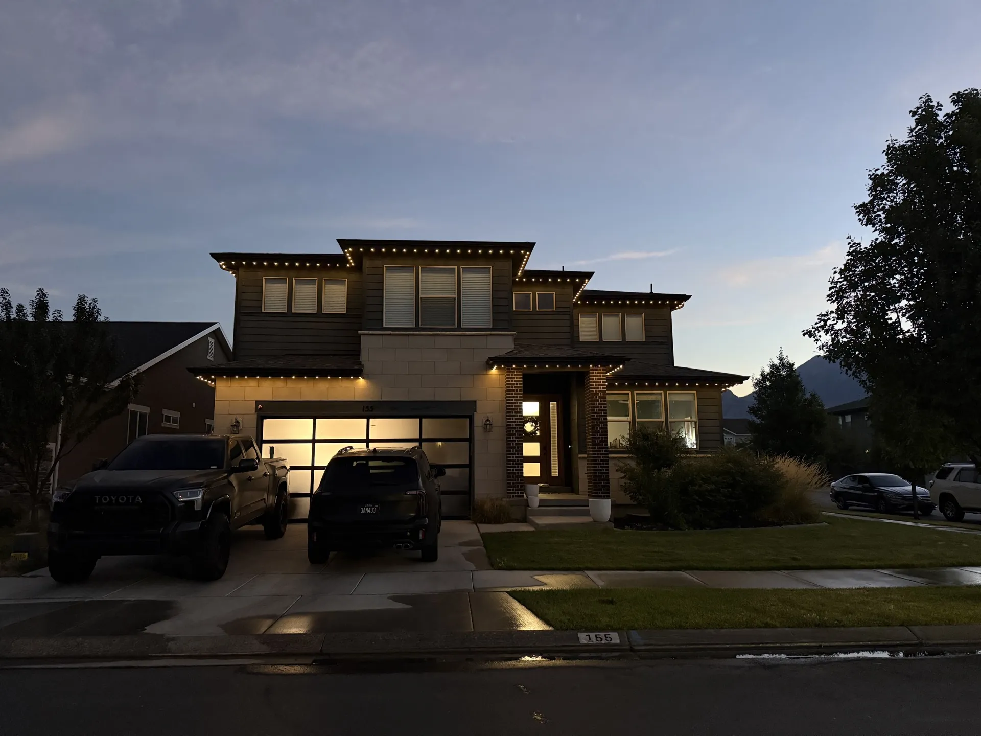 Modern Utah home with permanent LED roofline lighting