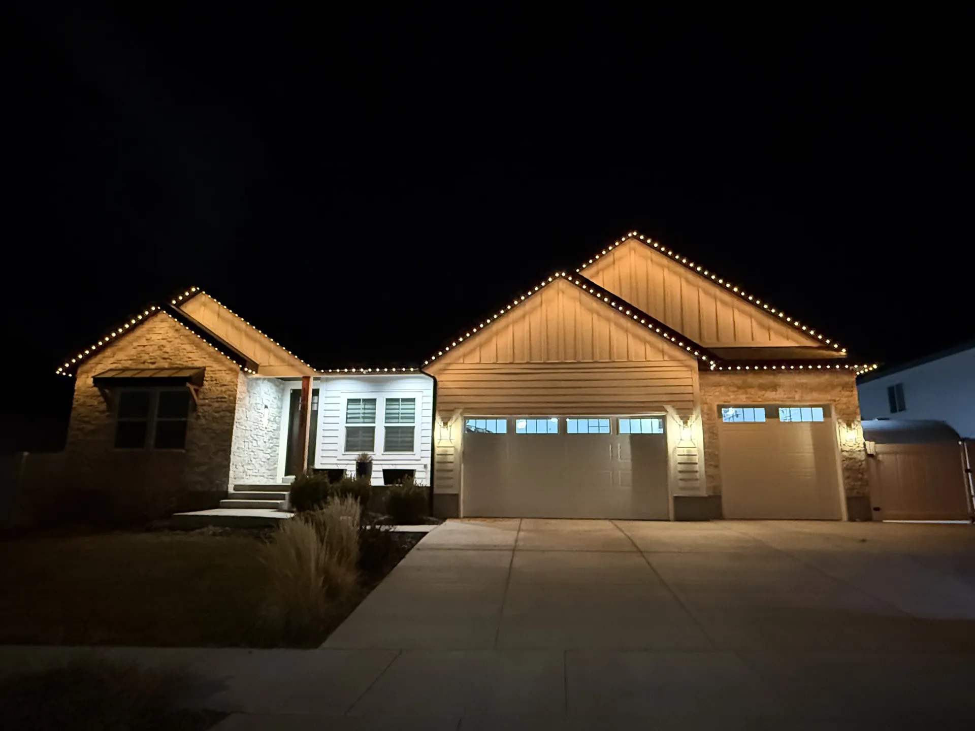 Contemporary home with permanent LED outdoor accent lighting